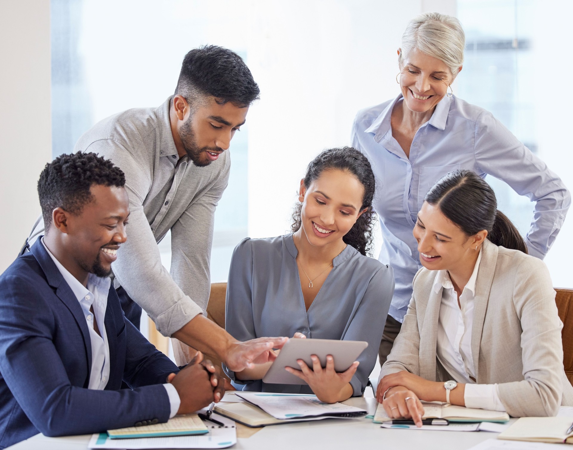 Shot of a group of businesspeople brainstorming and exchanging ideas in a modern office